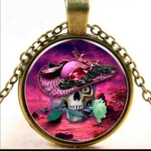 Beautiful vintage look skull head glass bronze color pendant chain necklace.